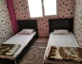 اتاق خواب با تخت های یک نفره آپارتمان در رضوانشهر 45646